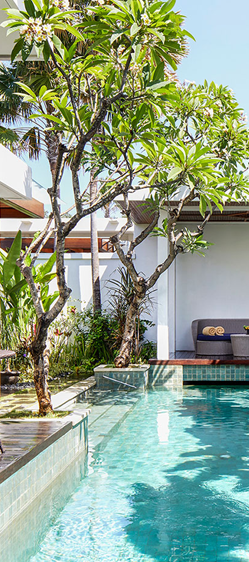 Aerial shot of hotel with two pools by the beach